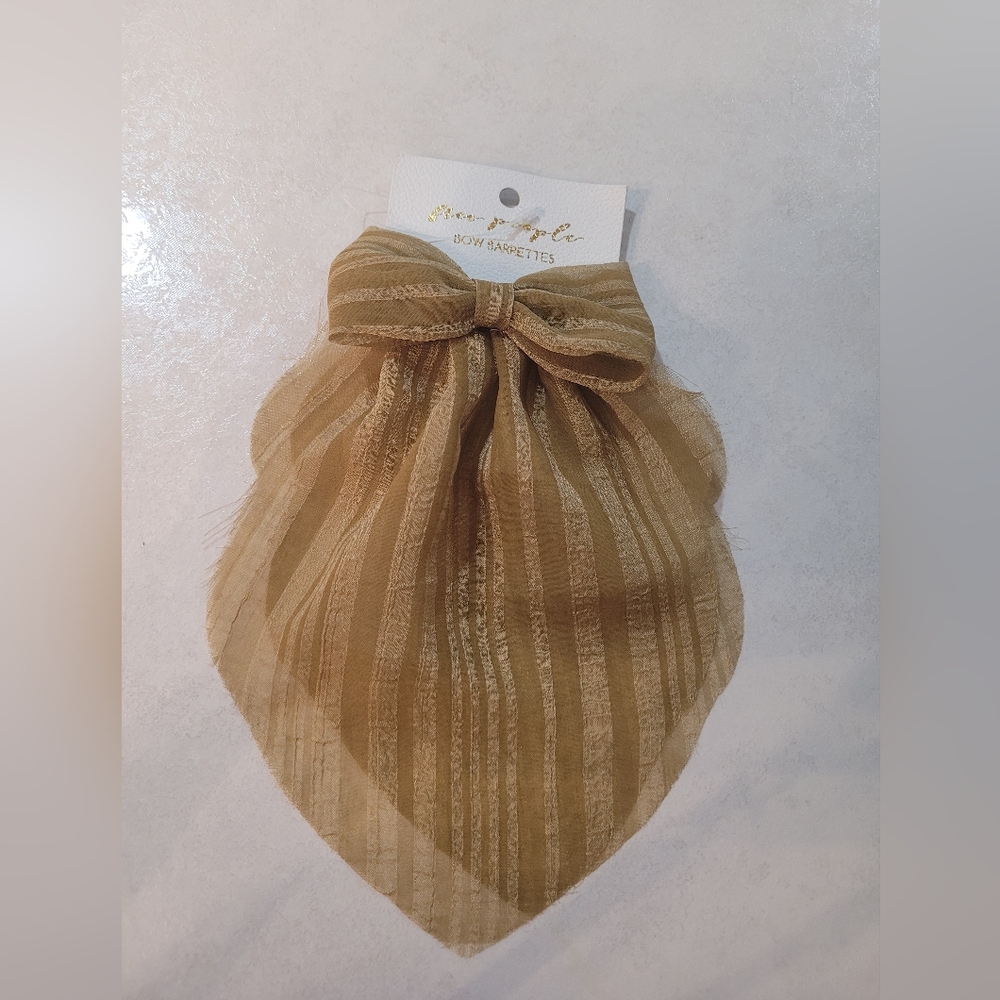 NWT Light Brown Free People Bow Barettes